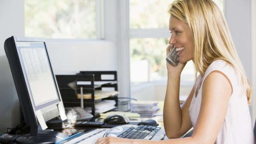 Woman working from her home office