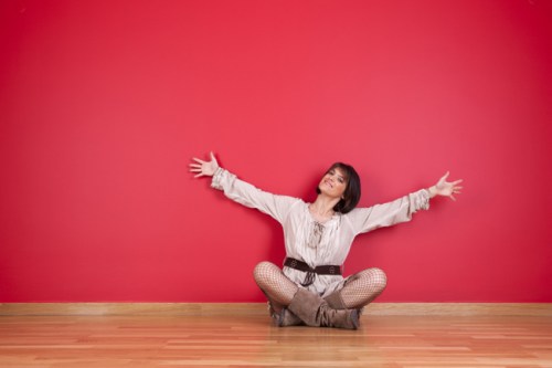 woman relaxing in a clean, tidy chicago apartment