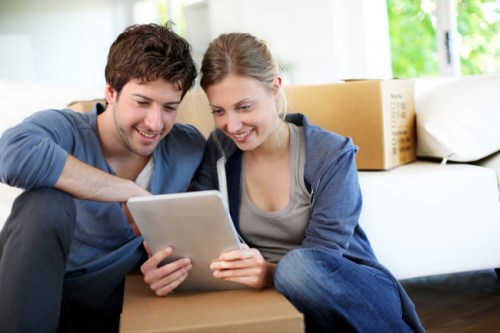 couple packing on moving day