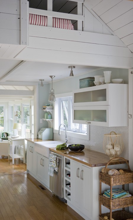 Simple white kitchen via houseandhome