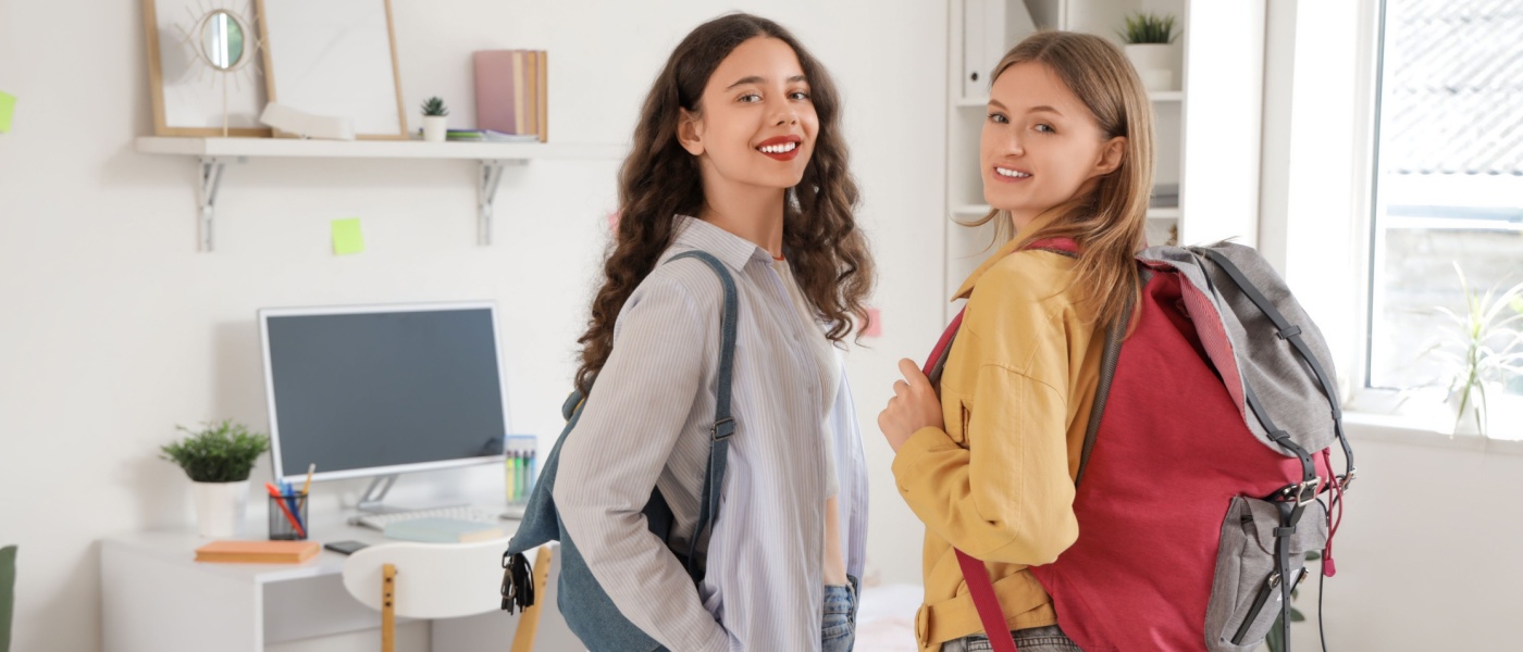 Two people in their first college apartment.
