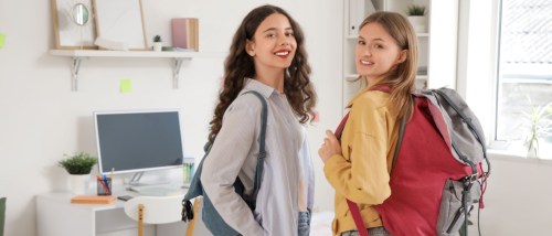 Two people in their first college apartment.