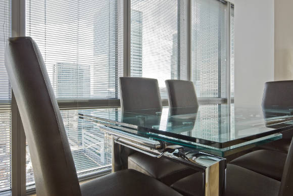 Window treatment - aluminum blinds in a modern office