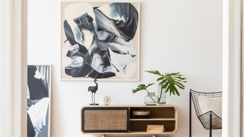 abstract art hanging on a wall