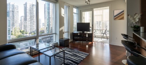 neat living room by window in city