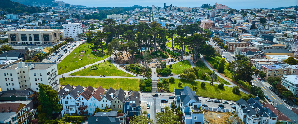 Aerial Alamo Square with backside view of The Painted Ladies in San Francisco, California.