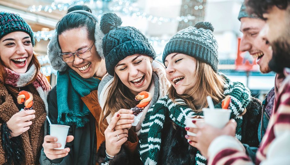 people enjoying christmas market