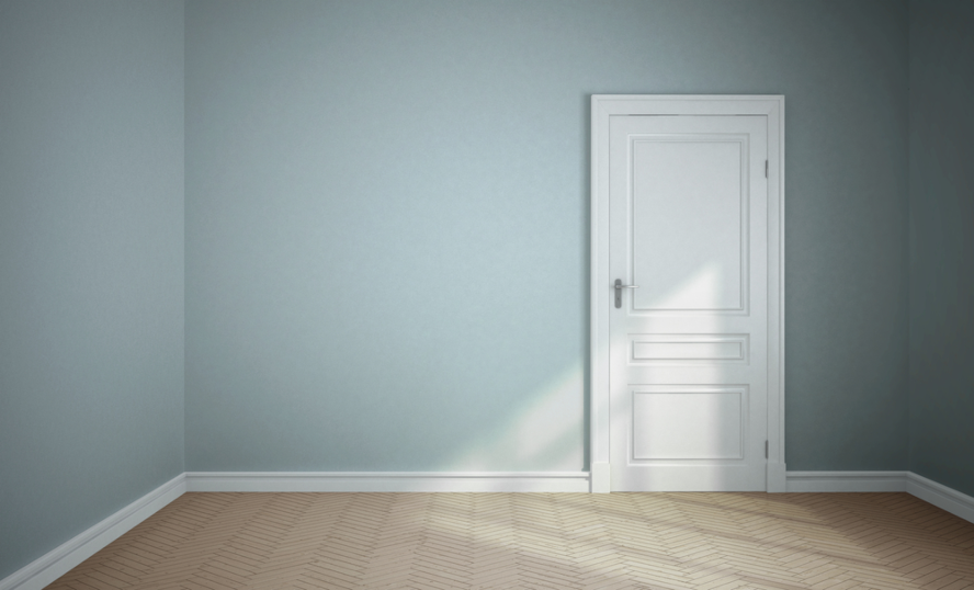 empty blue room with white door