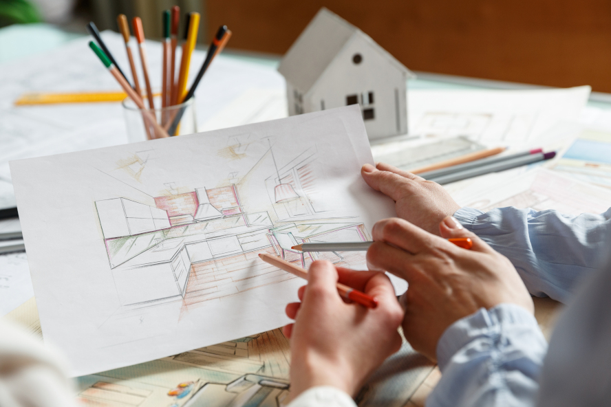 designers working on interior design sketch of kitchen remodeling
