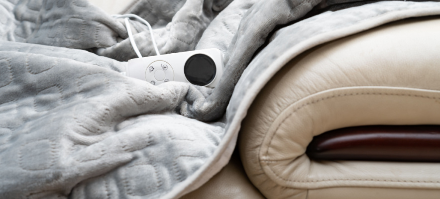 electric blanket sitting on sofa