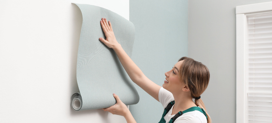 renter applying wallpaper