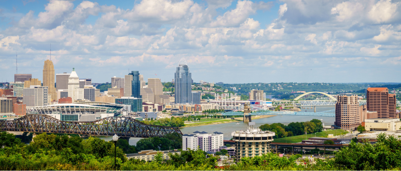 Scenic view of downtown Cincinnati, OH, skyline and bridges across the Ohio River.