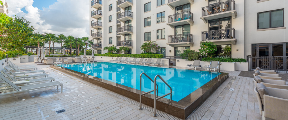 The swimming pool at an apartment building in Miami Beach, FL