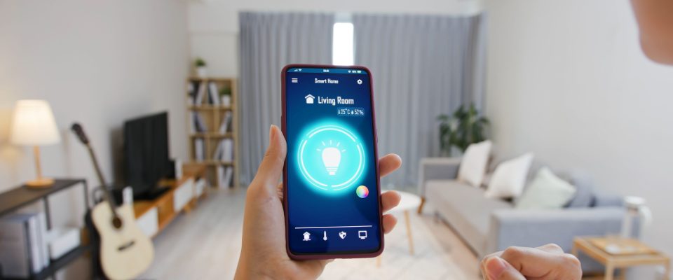 Smart lighting controlled by smart phone in the living room of a rental apartment.