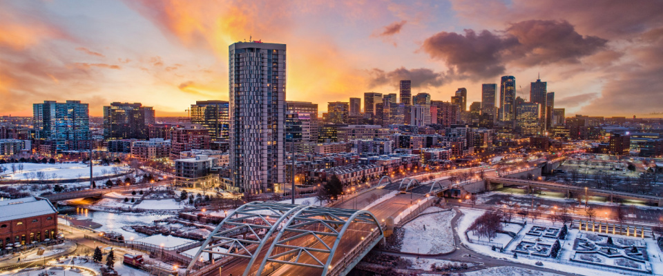 skyscrapers, roads and bridges in denver at sunset