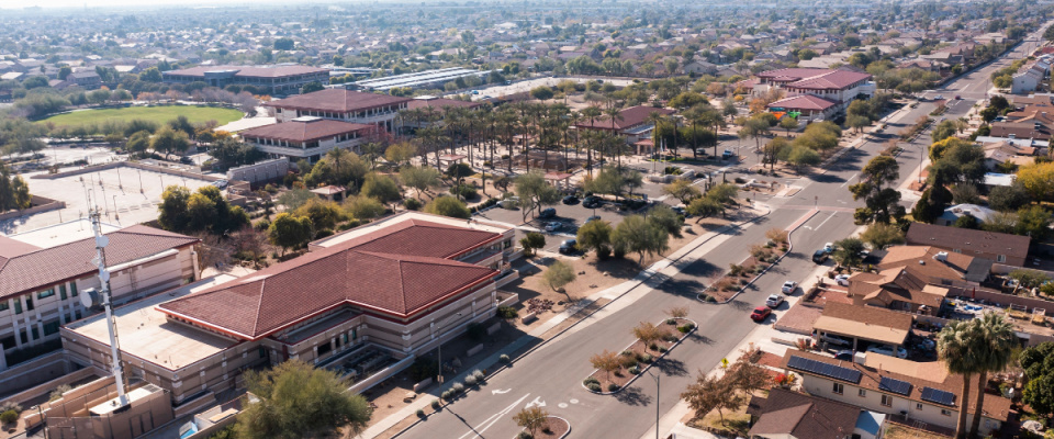 houses and other buildings and trees seen from above in peoria arizona