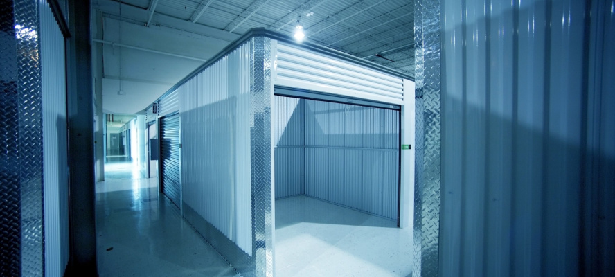 Open Storage Unit. Climate Controlled Modern Storage Warehouse - Storage Facility Interior.