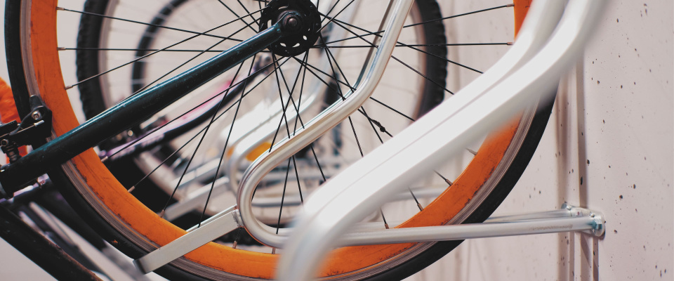 close-up of a bicycle wheel in a bike rack