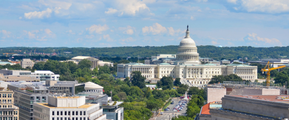 Washington, DC. Aerial view of Pennsylvania Avenue with federal buildings, including the US Archives Building, the Department of Justice and the US Capitol.