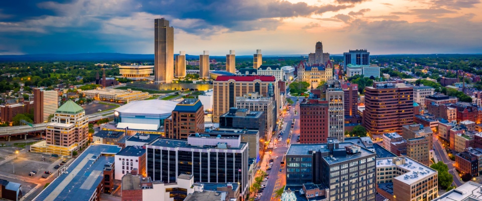 Aerial panorama of Albany, New York downtown along State street, at dusk. Albany is the capital city of the U.S. state of New York and the county seat of Albany County