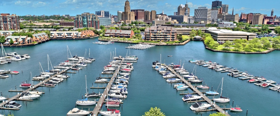 Aerial view of the Buffalo waterfront with many boats anchored in the harbor