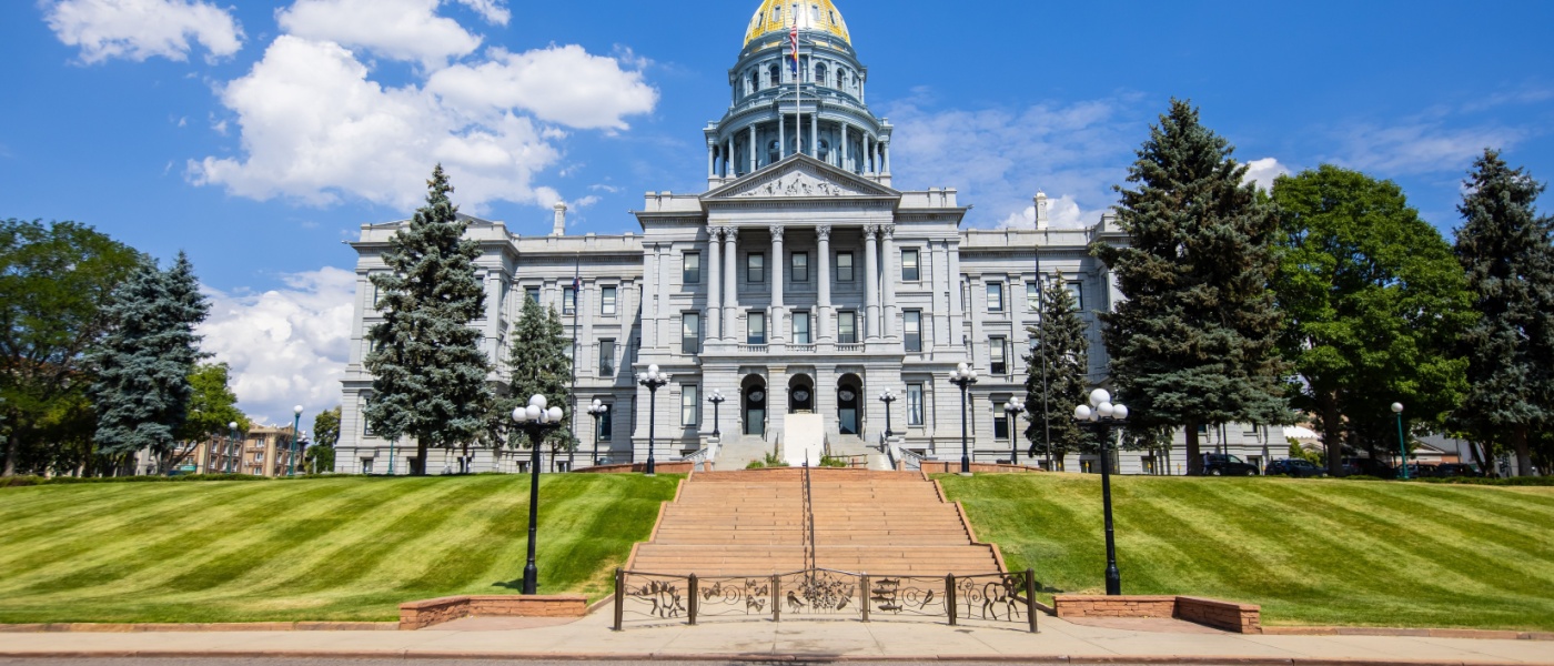 View of the Colorado state Capitol building against the blue sky.