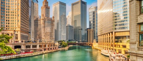 View of Chicago, IL's cityscape at sunrise.