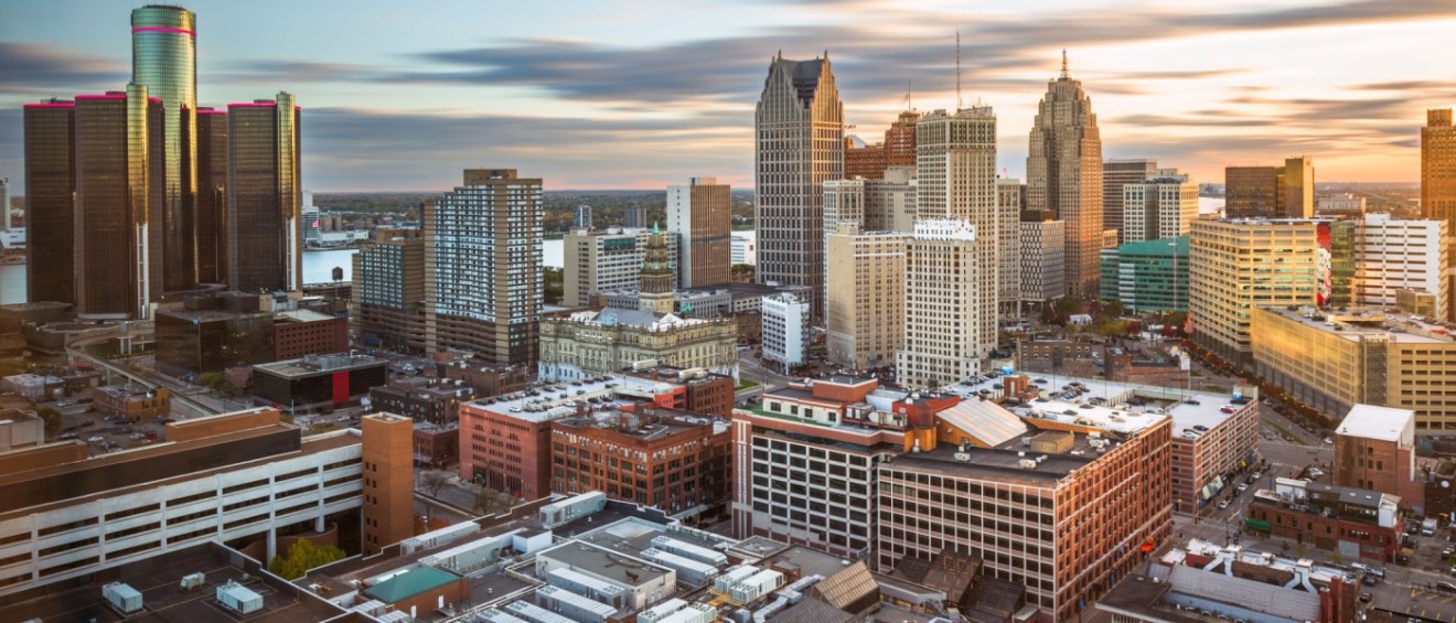Skyline of a city downtown in Michigan from above at dawn.