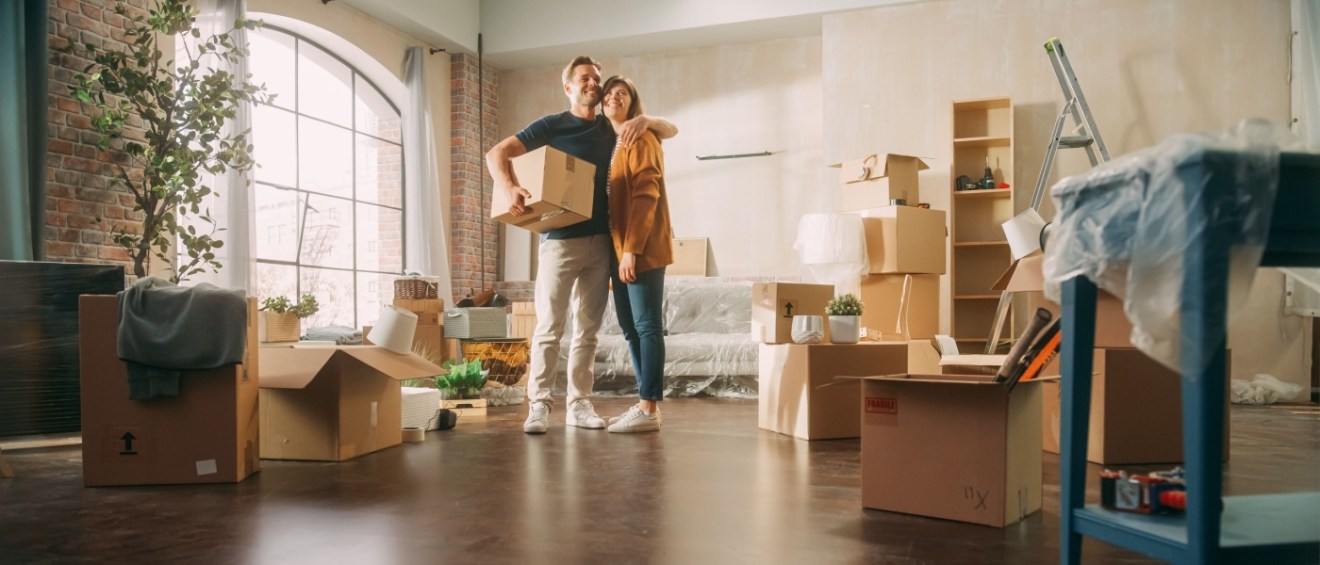 Couple moving in a new home