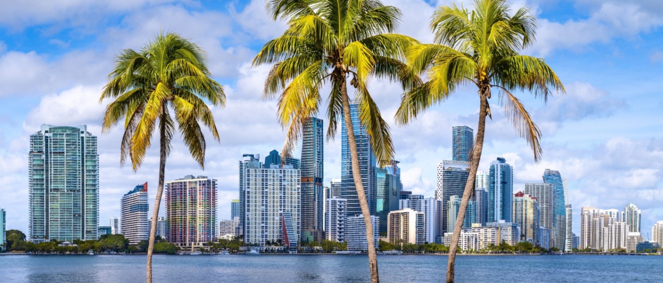 The skyline of Miami, FL, a city where renters with a budget of $,1500 a month can get cozy apartment spaces.