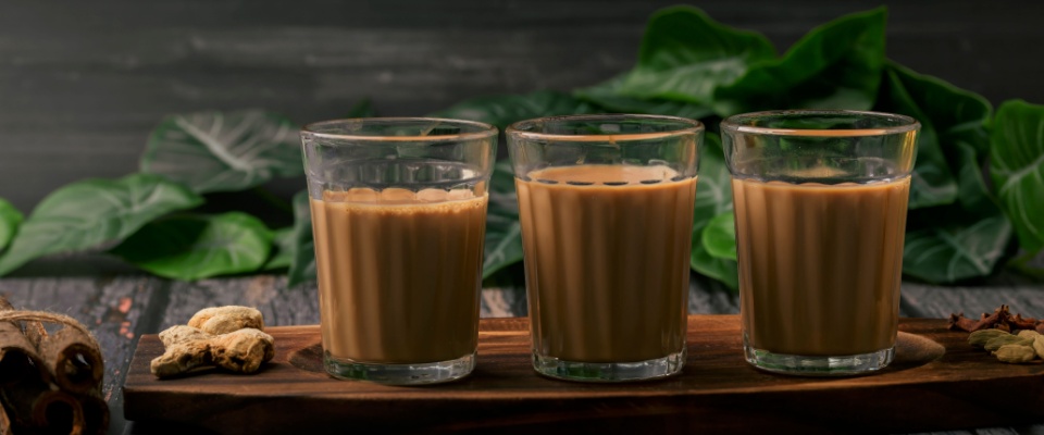 Freshly brewed masala tea, also known as Indian Kadak Chai, served in glass cups. 