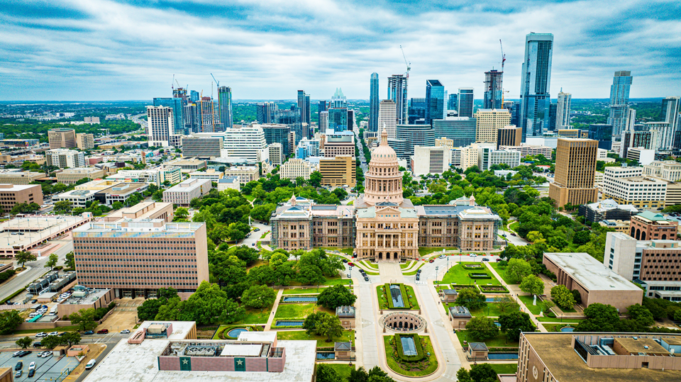 state capitol and skyscrapers against austin skyline