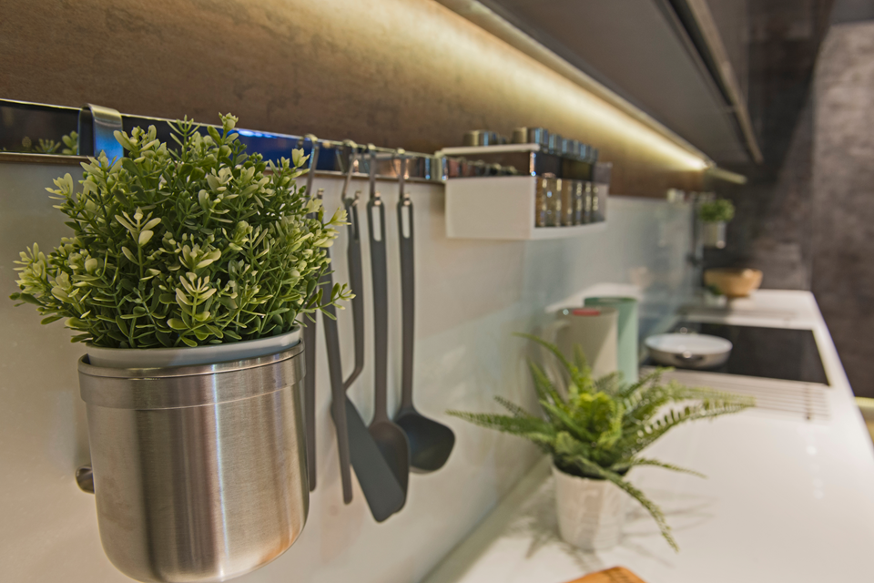 under cabinet storage with hooks in kitchen
