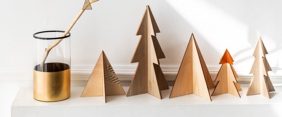 A unique, non-traditional Christmas tree decorated with unconventional ornaments and creative design elements. 