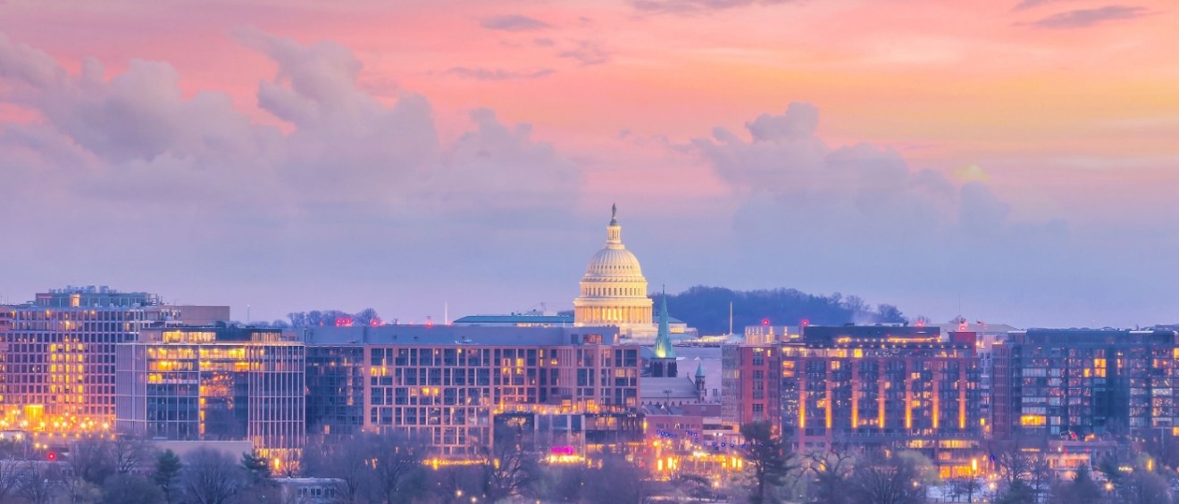 "Washington, D.C. cityscape at sunset. The city offers some affordable neighborhoods with rents below $2,000 per month.