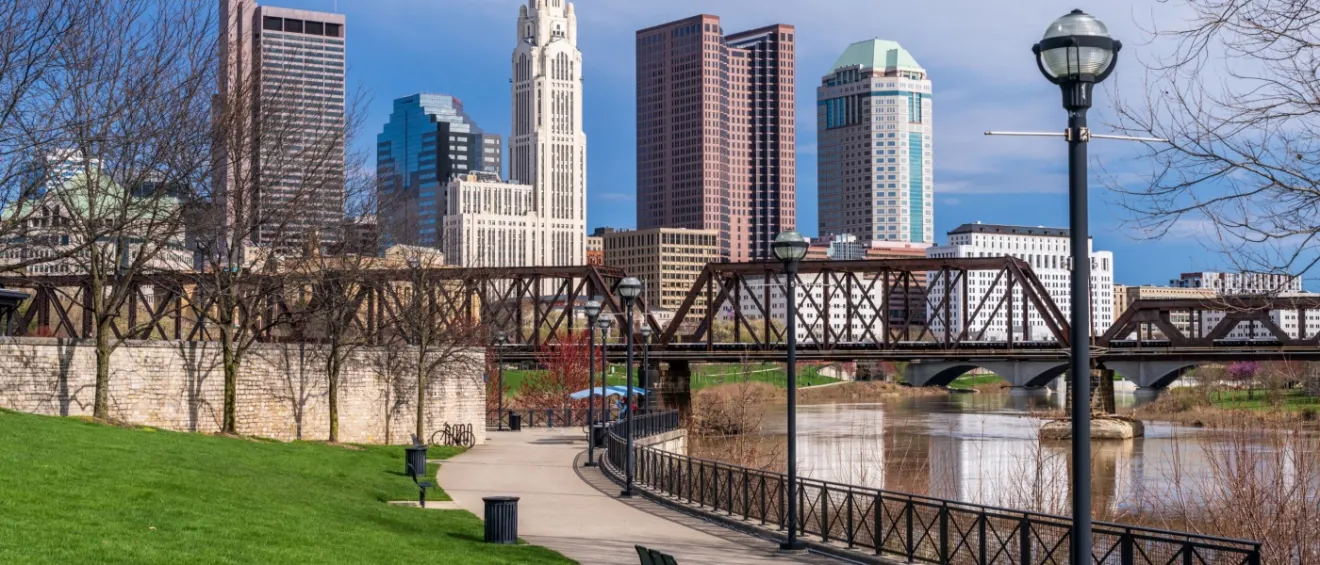 View of Columbus, OH's waterfront and downtown, showing one of the affordable neighborhoods in the city.