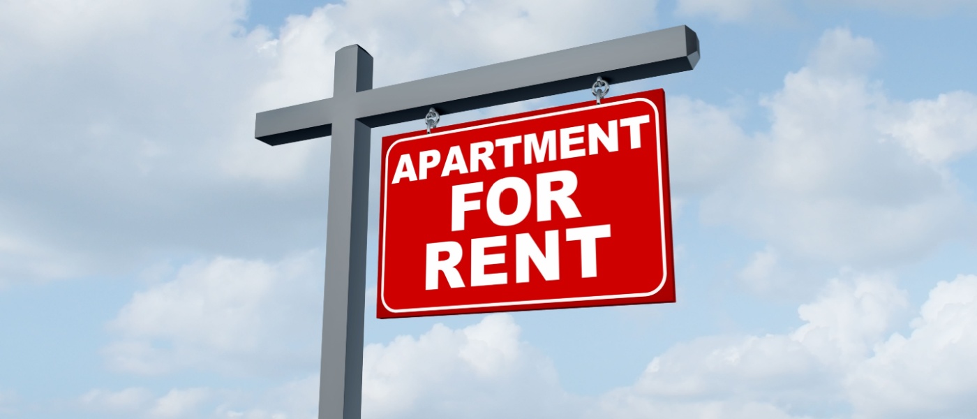 Apartment For Rent sign as Real Estate promotional billboard marketing the rental of apartments or apartment listings with an agent or landlord.