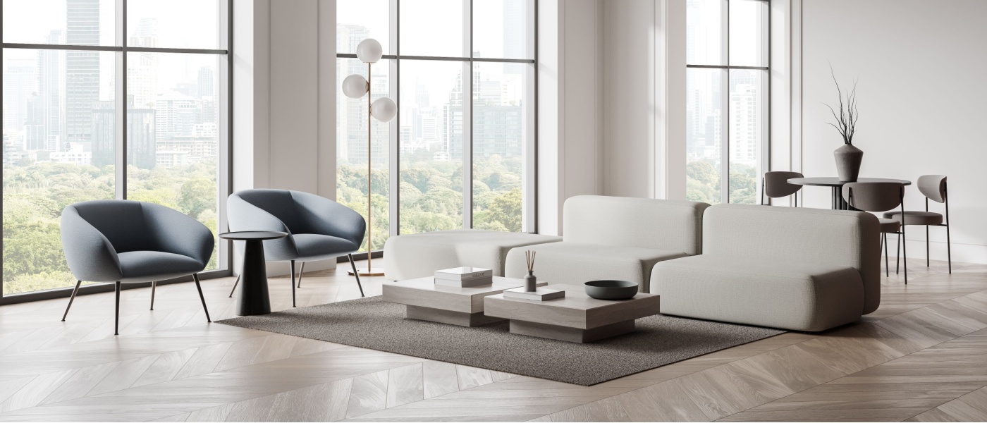 A stylish living room with modern furniture and minimalist decor, featuring large windows that offer a stunning view of the cityscape.