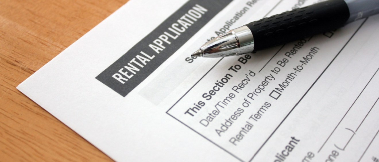 Close up of a rental application form and a pen.