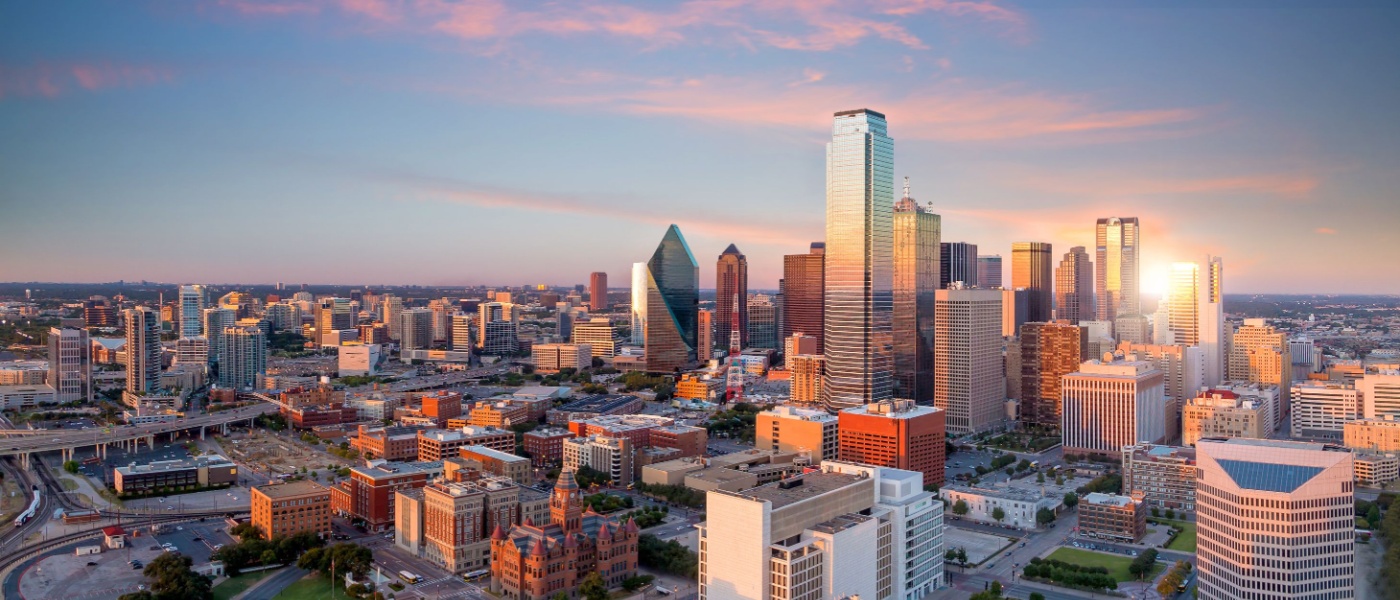 An aerial view of the skyline in downtown Dallas, a city in Texas where you can find affordable neighborhoods with rent prices below the local and national average.