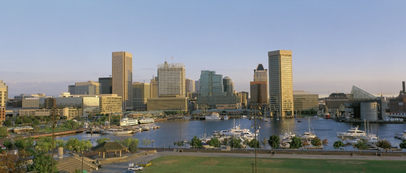 The skyline of Baltimore in dayligh along the inner harbor.