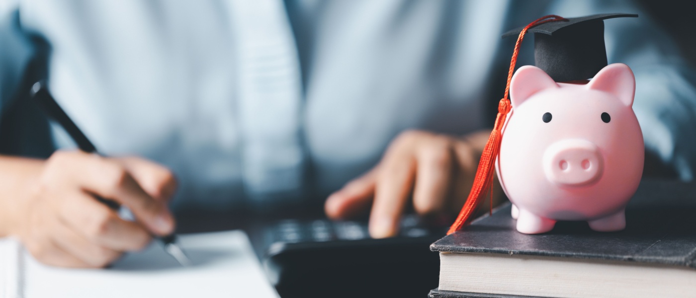 Student planning for college tuition, university fees, and scholarships involves investing in education and preparing for studying abroad. The scene highlights financial preparation for student loans.