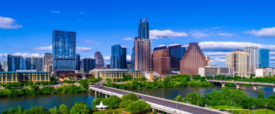 Sunny Austin, TX skyline over the river, ranked the #1 US move-easy metro for frequent renters.