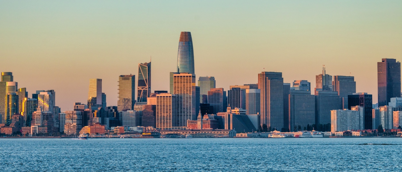 Scenic view of downtown San Francisco, California, USA, with the skyline at sunrise, highlighting the city's beauty and its high cost of living.
