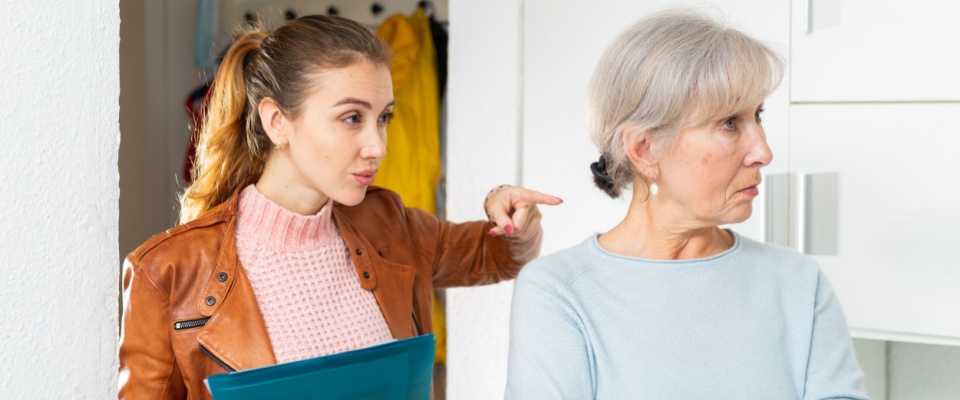 A person talking to a landlord before signing a lease agreement.