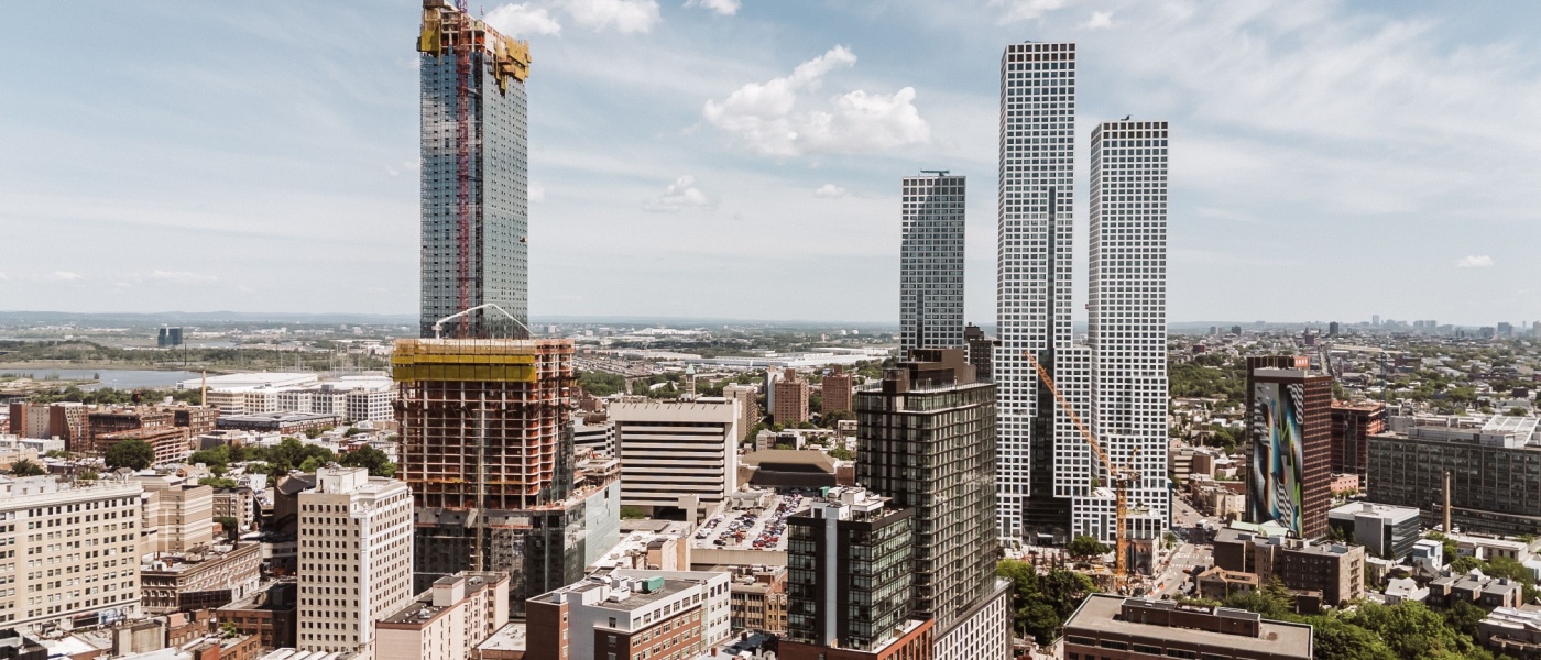 The skyline of Jersey City, NJ, where renters can find affordable neighborhoods.