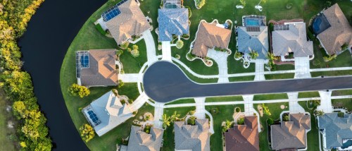 View from above of residential houses in living area in North Port, FL, to illustrate the place with the largest growth in Millennial homeownership.