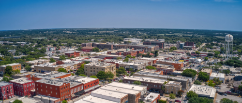 An aerial view of McKinney, TX, a city where the cost of living is higher than the state average, but lower than the U.S. average.