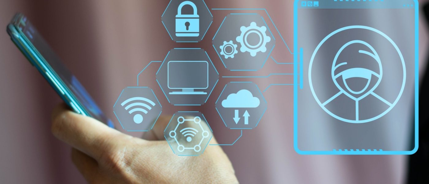 Person holding a smartphone with holographic icons representing security, cloud, and wireless network, visually illustrating identity theft protection and secure digital identity management.