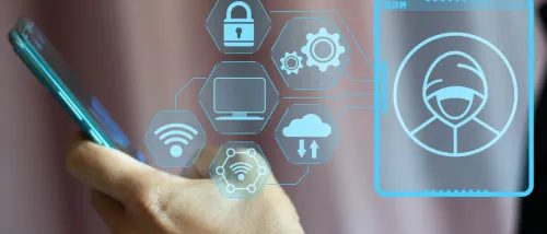 Person holding a smartphone with holographic icons representing security, cloud, and wireless network, visually illustrating identity theft protection and secure digital identity management.